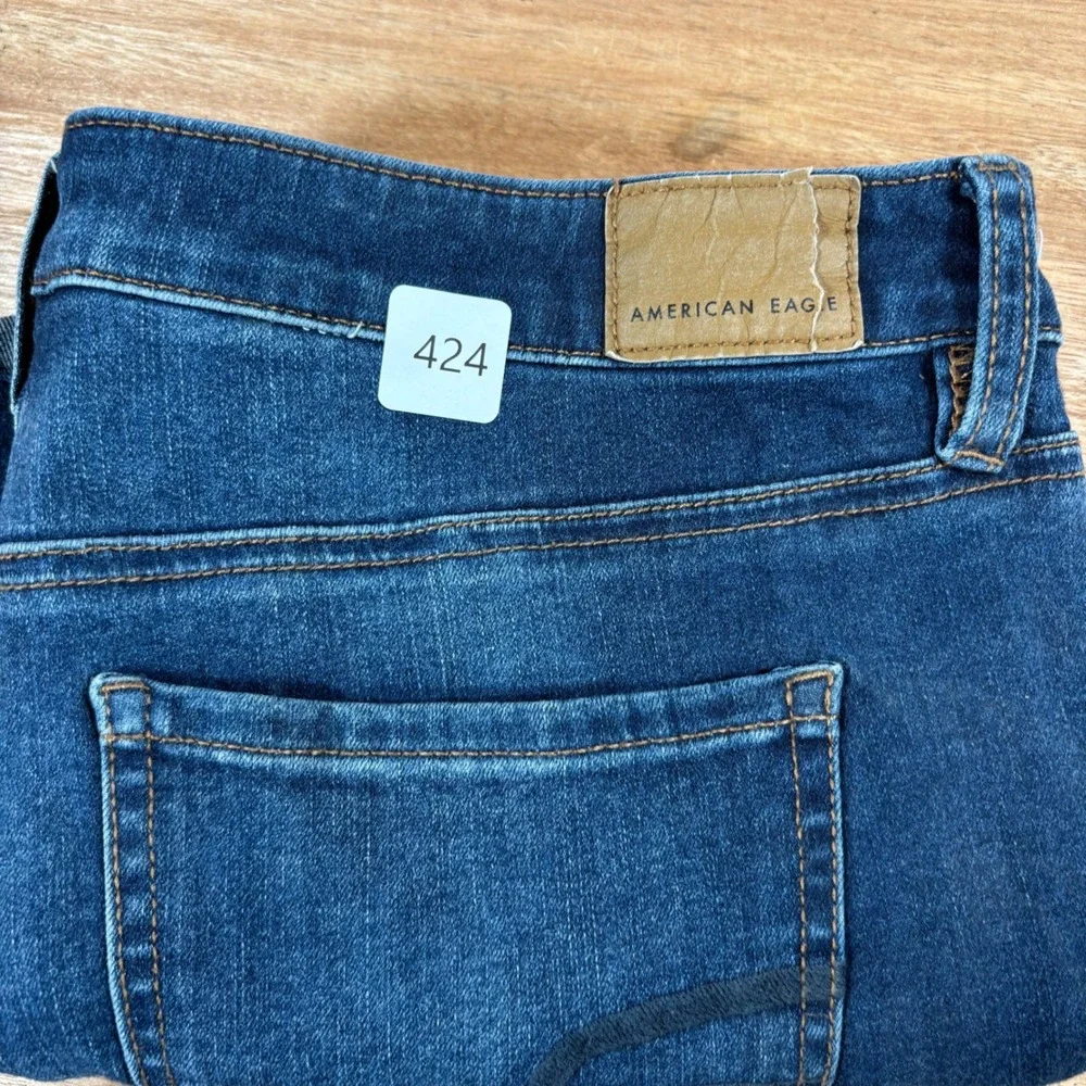American Eagle Next Level Stretch Denim Shorts Medium Wash Raw Hem Size 14 Long